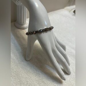 Vintage silver bracelet with hematite panels and smoked rhinestones